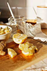 Honey, lemon and ginger on old wooden table