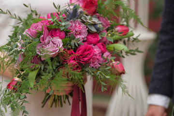 wedding purple boho bouquet in bride's hands