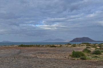 landscape from the Spanish Canary Island Fuerteventura with dunes and the ocean