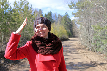 woman in a coat on a walk