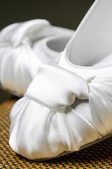 Fototapeta na wymiar White wedding shoes on high heels.