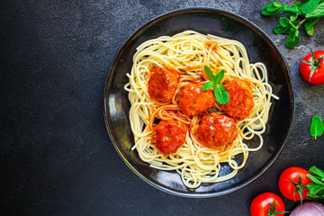 pasta spaghetti meatballs tomato sauce, main course Menu concept, food background, diet. top view. copy space for text