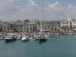 Trani – panorama from a terrace in the Villa Comunale park of the Port made up of a natural bay with fishing boats and tourist boats