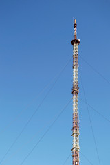 Obraz premium Tower for cellular communication and data transmission. Mobile phone Telecommunication Radio antenna Tower.