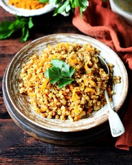 Buckwheat stew with vegetables in a ceramic bowl. rustic