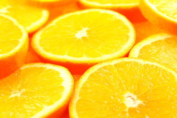 slices of fresh orange fruits food background texture