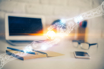 Double exposure of desktop computer and technology theme hologram. Concept of software development.