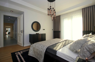 Modern and Stylish Bedroom Design with Furniture and Decorative Accessories at the New Home