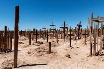 An old cemetery with wooden crosses near the abandoned towm of Pampa Union, in the Atacama Desert, Chile, South America.