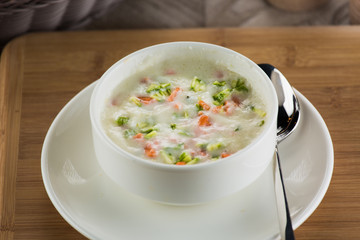 Yoghurt soup. Traditional Turkish soup with dry mint and hot pepper planted.