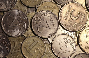 A lot of rubles in a pile. Coins: 1, 2, 5. "Ruble"