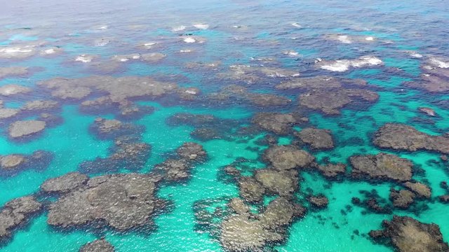 Aerial drone footage of Wadra Bay in Lifou New Caledonia.
