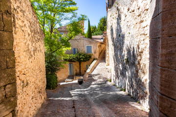 Narrow street in Gordes village in France, Provence
