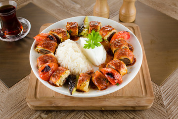 Turkish Beyti Kebap garnished with vegetables