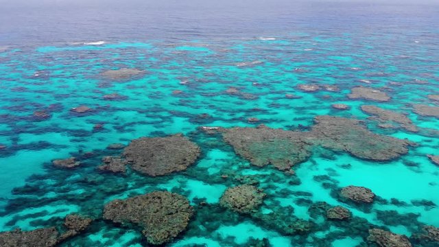 Aerial drone footage of Wadra Bay in Lifou New Caledonia.
