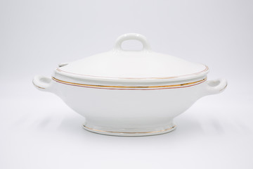 Soup bowl white vintage with golden rim on white backround