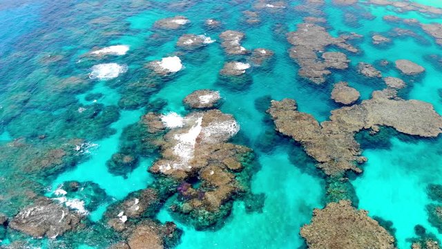 Aerial drone footage of Wadra Bay in Lifou New Caledonia.