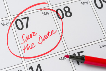 Save the Date written on a calendar - May 07