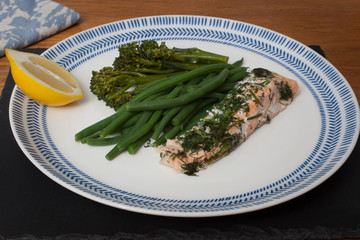 Oven baked salmon with dill, green beans and broccoli