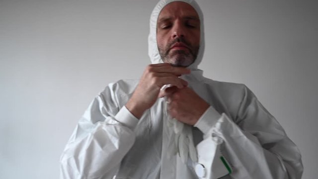 Operator equipping himself to perform tests to detect covid19 virus