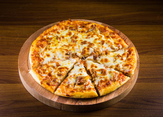 Hot Turkish pide pizza closeup on a wooden table. horizontal top view