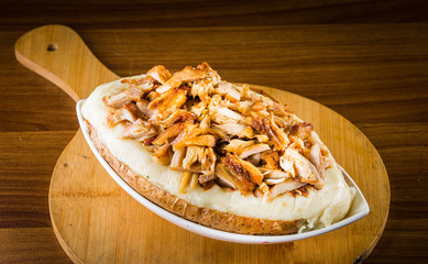 Turkish national dish called 'kumpir' which is baked potato stuffed with vegetables