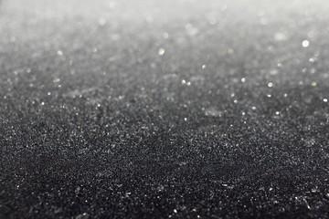 Gray ice gradient structure surface from dark to blurred light in perspective, texture for background
