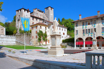  maggiore square with palio flags in feltre city in italy