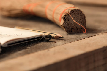 Various carpenter's tools on a wooden table ready for repair.