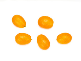 ripe kumquat fruits, isolated on a white background