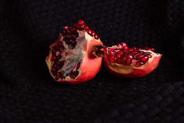 Pomegranate on a black background