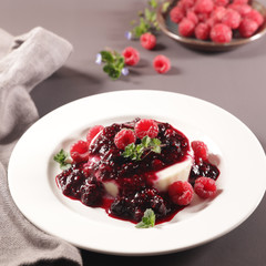 panna cotta with berry fruit in plate