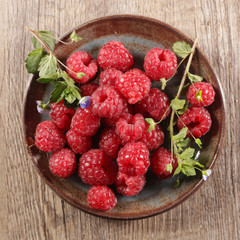 berry fruit, raspberry and leaf- top view