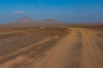 Fototapeta na wymiar Sandy road through the desert of Cape verde islands