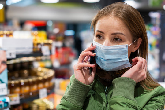 Woman wearing a mask in supermarket