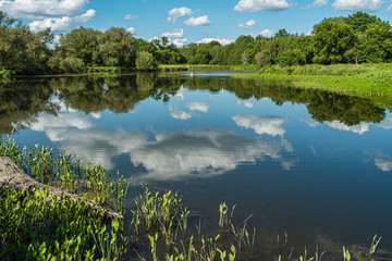 Beautiful looking lake with the clouds reflecting in the water