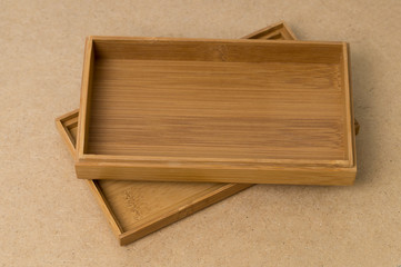 open wooden box on with lid on wooden background, mock up
