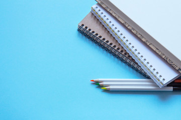 Set of stationery on blue background. Flat lay