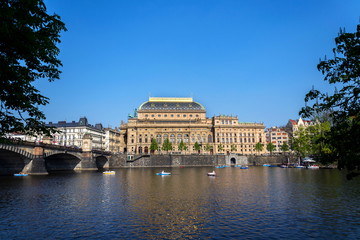 Fototapeta na wymiar Prague panorama with National Theatre on the bank of Vltava River, Prague, Czech Republic, sunny summer day