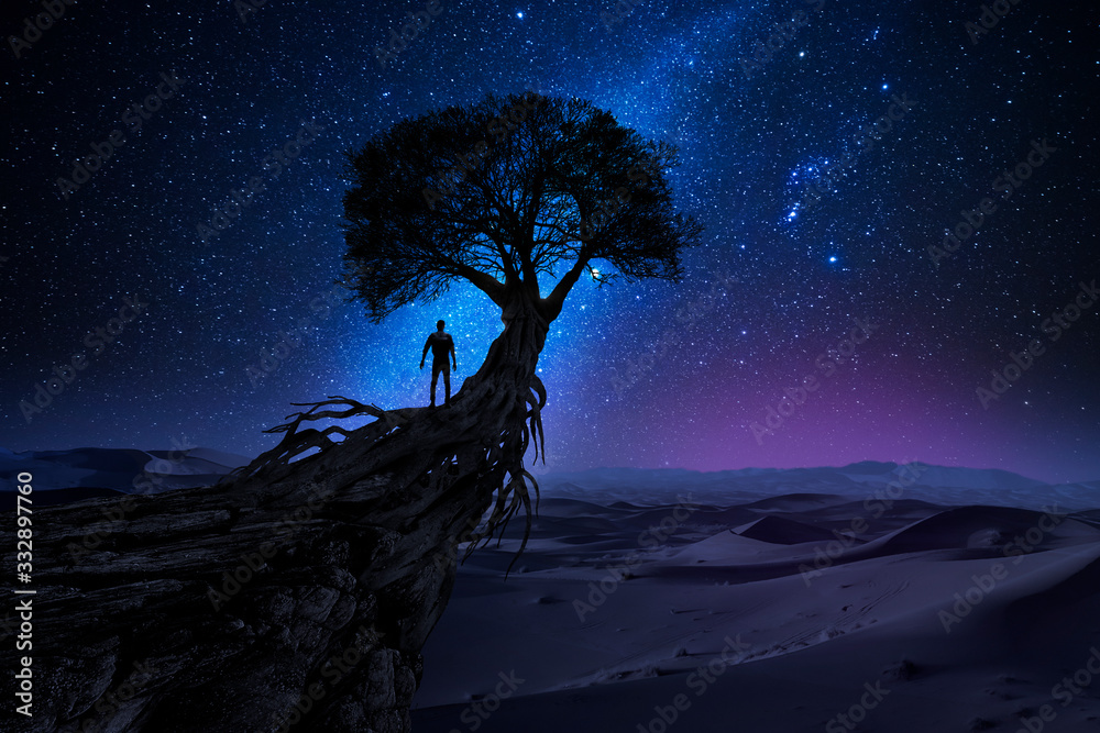 Canvas Prints man under a tree in front of the universe