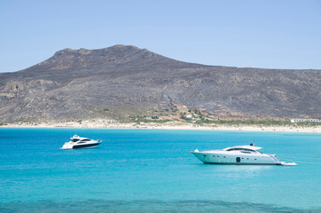 Two yachts in Simos Bay on the island Elafonisos in Greece