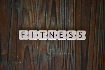 Letras formando la palabra fitness, deporte