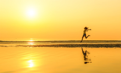 Woman jump in the sunlight.