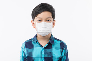 Boy wearing surgical mask.