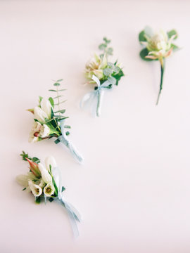 Wedding boutonnieres. Groom's and bestman's decorations close-up
