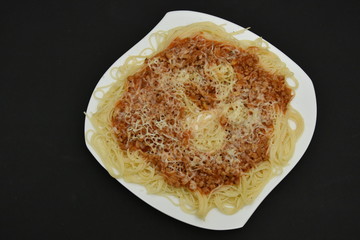 Spaghetti bolognese on a white plate,Spaghetti Recipes 