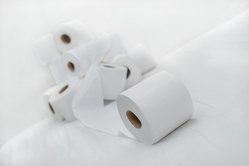 Rolls of daily use toilet paper