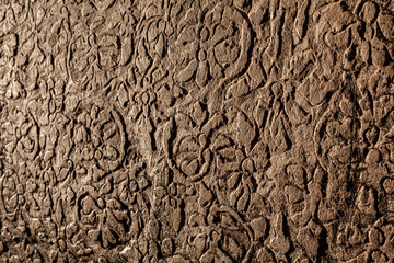 Old drawings and letters engraved on stone