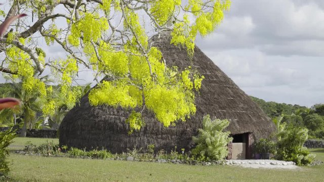 Traditional Kanak house on Ouvea Island, Loyalty Islands, New Caledonia. Kanak are the indigenous Melanesian inhabitants of New Caledonia.