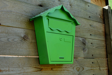 mailbox on a wooden wall